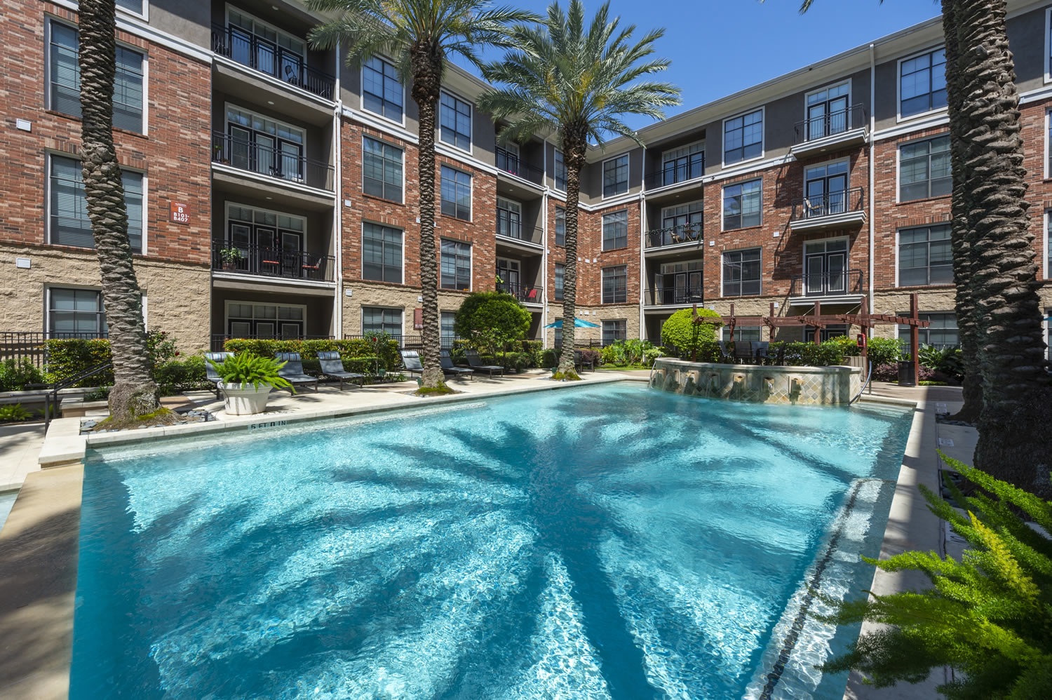 Apartments in Uptown Houston, Galleria Area A swimming pool at an apartment complex in the Uptown Houston area.