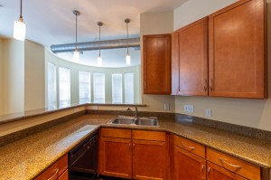 Two Bedroom Apartments for Rent in Houston, Texas - Apartment Kitchen with Breakfast Bar & Living Room View
